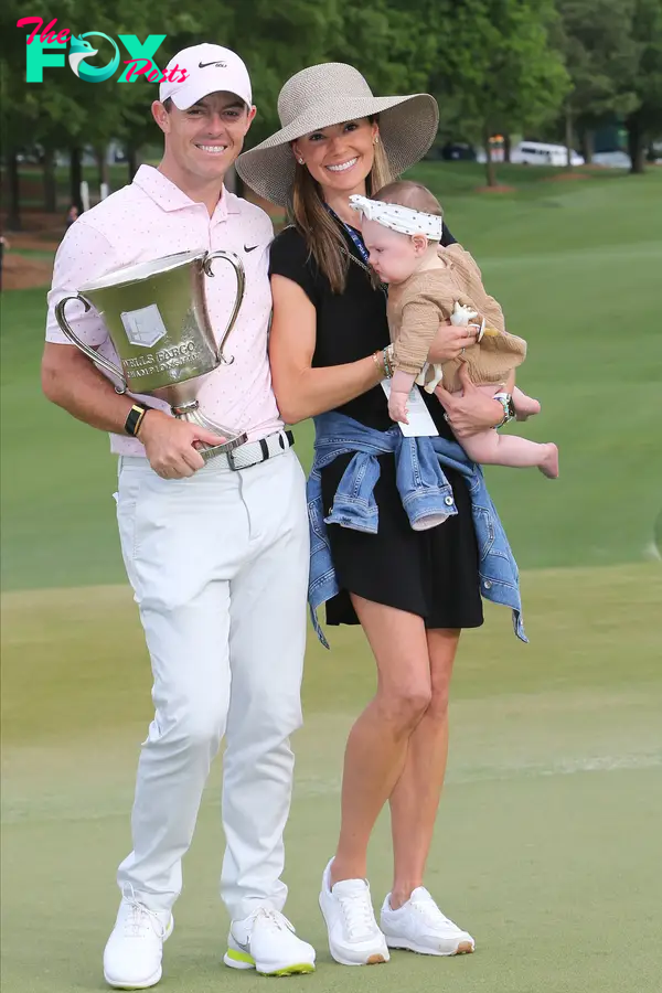 Rory McIlroy and Erica Stoll and their daughter.