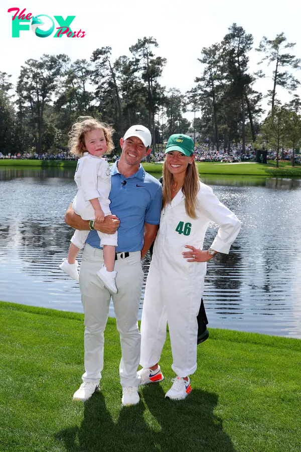 Rory McIlroy and Erica Stoll and their daughter.