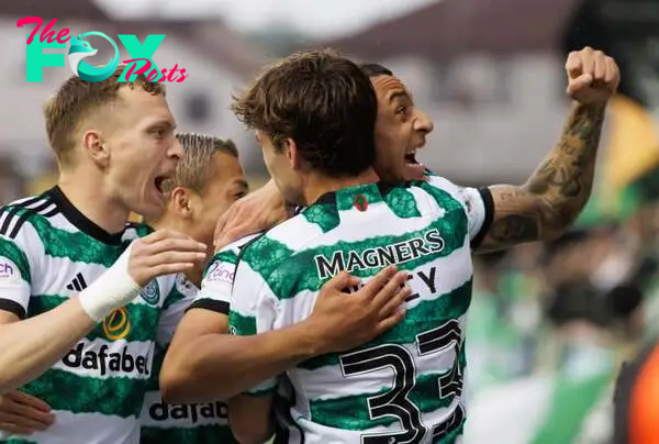 Adam Idah of Celtic celebrates his goal during the Cinch Scottish Premiership match between Kilmarnock FC and Celtic FC at Rugby Park on May 15, 20...