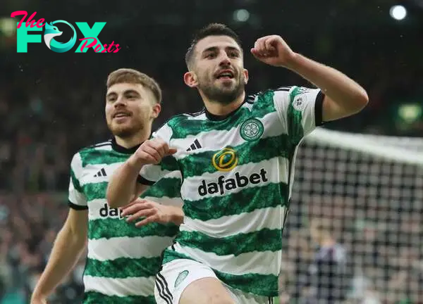 Greg Taylor of Celtic celebrates after he scores his team's  third goal during the Cinch Scottish Premiership match between Celtic FC and Kilmarnoc...