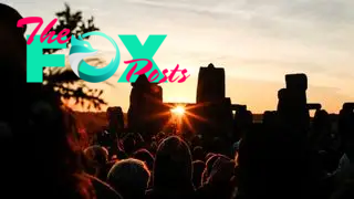 Crowds celebrating summer solstice and the dawn of the longest day of the year at Stonehenge on June 21, 2018 in Wiltshire, England.