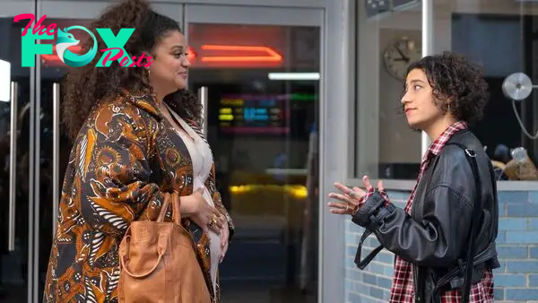 Dawn (Michelle Buteau) and Eden (Ilana Glazer) meet in front of a movie theater