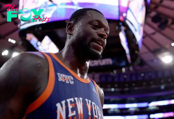 Julius Randle #30 of the New York Knicks walks off the court after the NBA In-Season Tournament game against the Charlotte Hornets at Madison Square Garden on November 28, 2023 in New York City.