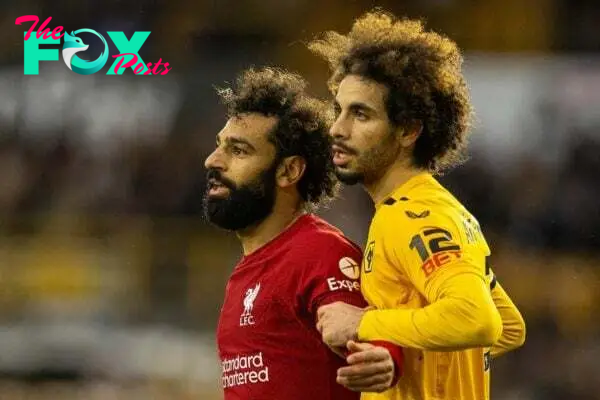 WOLVERHAMPTON, ENGLAND - Saturday, February 4, 2023: Liverpool's Mohamed Salah (L) and Wolverhampton Wanderers' Rayan Aït-Nouri during the FA Premier League match between Wolverhampton Wanderers FC and Liverpool FC at Molineux Stadium. (Pic by David Rawcliffe/Propaganda)