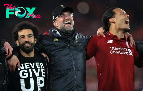 Liverpool's Mohamed Salah (left), manager Jurgen Klopp (centre) and Virgil van Dijk celebrate after the UEFA Champions League Semi Final, second leg match at Anfield, Liverpool.