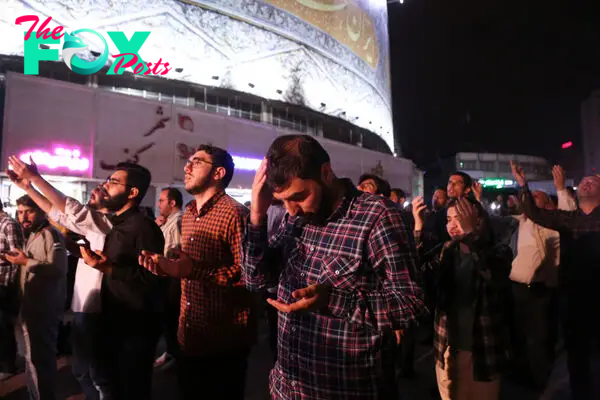 Iranians pray for the President Raisi and his accompanying officials