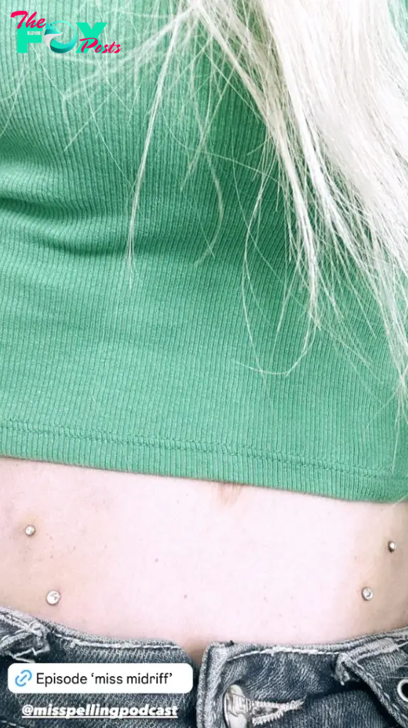 Tori Spelling's stomach piercings