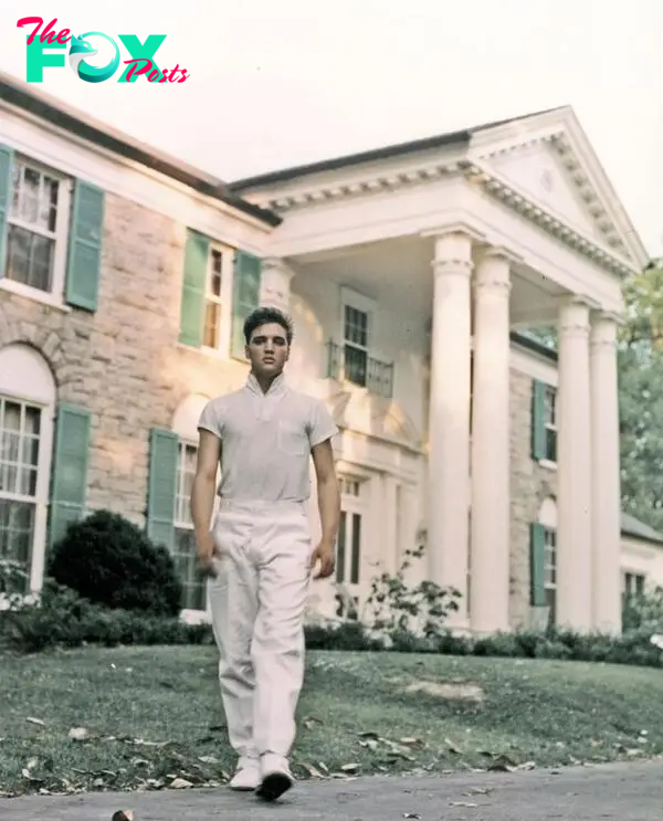 Elvis Presley strolls the grounds of his Graceland estate in 1957