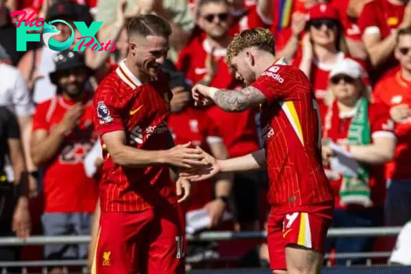 LIVERPOOL, ENGLAND - Saturday, May 18, 2024: Liverpool's Alexis Mac Allister celebrates with team-mate Harvey Elliott (R) after scoring the opening goal during the FA Premier League match between Liverpool FC and Wolverhampton Wanderers FC at Anfield. (Photo by David Rawcliffe/Propaganda)