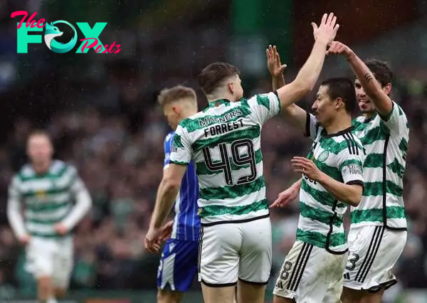 James Forrest of Celtic celebrates after he scores his team's third goal during the Cinch Scottish Premiership match between Celtic FC and St. John...