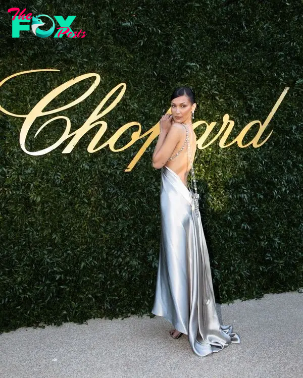 Bella Hadid in a backless silver dress at the 2024 Cannes Film Festival