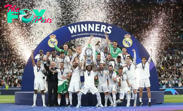 Real Madrid lift the trophy after the UEFA Champions League final match between Liverpool FC and Real Madrid at Stade de France 