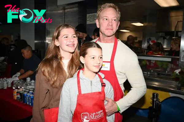 Ian Ziering and his daughter Mia and Penna volunteer to help with serving food to the homeless community.