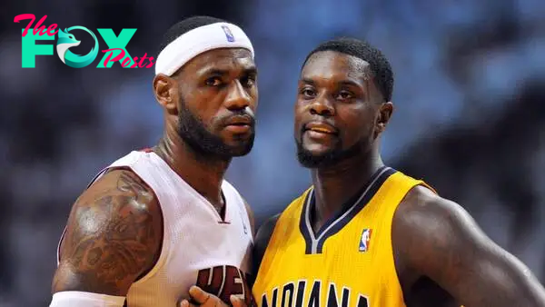 May 30, 2014; Miami, FL, USA; Miami Heat forward LeBron James (left) stands next to Indiana Pacers guard Lance Stephenson (right) during the first half in game six of the Eastern Conference Finals of the 2014 NBA Playoffs at American Airlines Arena. Mandatory Credit: Steve Mitchell-USA TODAY Sports