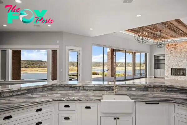 Panoramic lake travis views from this prime waterfront home in spicewood listed at 6 million 13