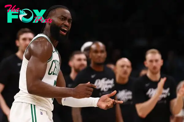 BOSTON, MASSACHUSETTS - MAY 21: Jaylen Brown #7 of the Boston Celtics reacts after making a three-point basket to tie the game late during the fourth quarter against the Indiana Pacers in Game One of the Eastern Conference Finals at TD Garden on May 21, 2024 in Boston, Massachusetts. NOTE TO USER: User expressly acknowledges and agrees that, by downloading and or using this photograph, User is consenting to the terms and conditions of the Getty Images License Agreement.   Maddie Meyer/Getty Images/AFP (Photo by Maddie Meyer / GETTY IMAGES NORTH AMERICA / Getty Images via AFP)