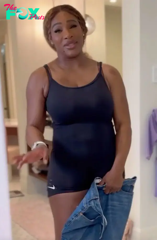 Serena Williams trying on a denim skirt. 