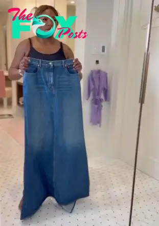 Serena Williams trying on a denim maxi skirt. 