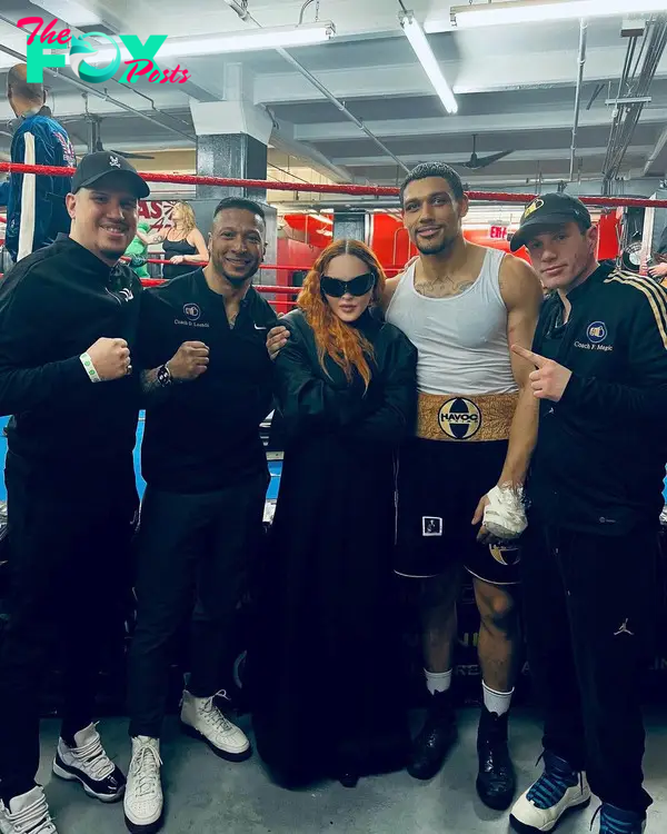 Josh Popper and Madonna and other people after his fight.