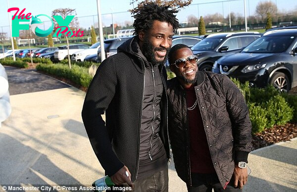 Manchester City striker Wilfried Bony (left) took time out to pose with Hart after training