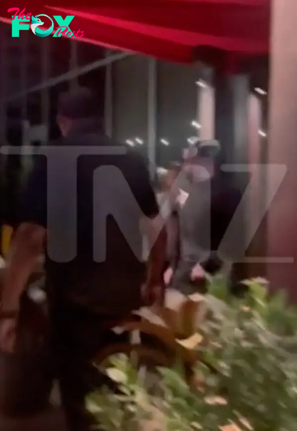 Kendall Jenner and Bad Bunny exiting a restaurant in Miami