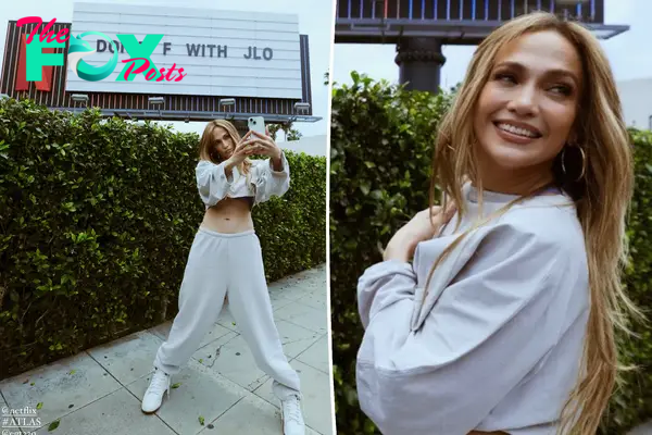 Jennifer Lopez poses for selfies in front of Netflix billboard.