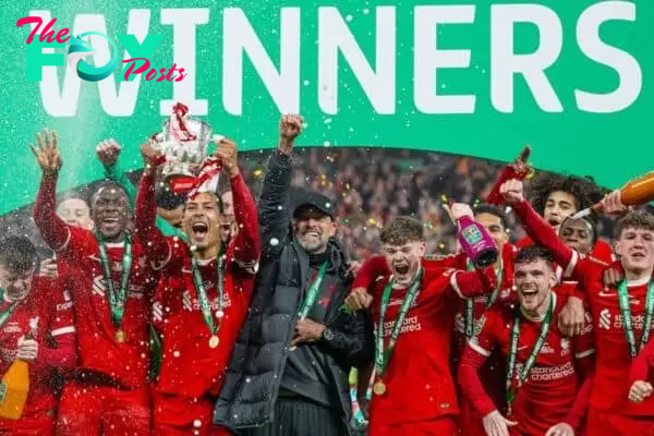 LONDON, ENGLAND - Sunday, February 25, 2024: Liverpool's goal-scorer captain Virgil van Dijk lifts the trophy after the Football League Cup Final match between Chelsea FC and Liverpool FC at Wembley Stadium. Liverpool won 1-0 after extra-time. (Photo by David Rawcliffe/Propaganda)