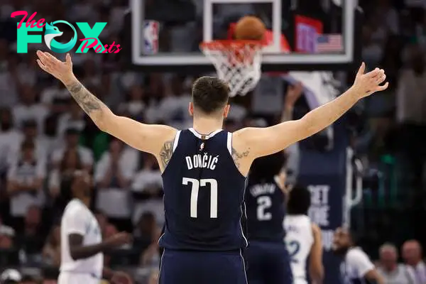 Dallas Mavericks guard Luka Doncic (77) celebrates