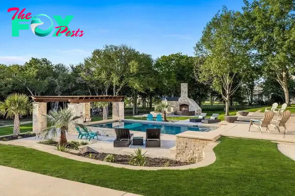 Stunning french inspired estate spanning 2 acres in the landing gated community listed for 7995000 5