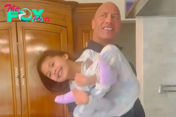 Dwayne Johnson Uses Daughter, 4, as Weight for His 'Daddy Curls': Watch