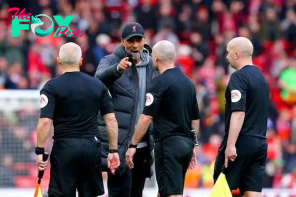 Jurgen Klopp accused referee Paul Tierney, second right, of unprofessionalism after Liverpool’s draw with Tottenham at Anfield (Peter Byrne/PA)