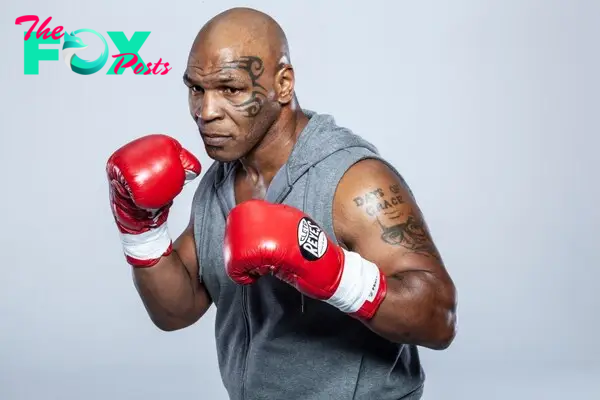 Mike Tyson in boxing gloves. 