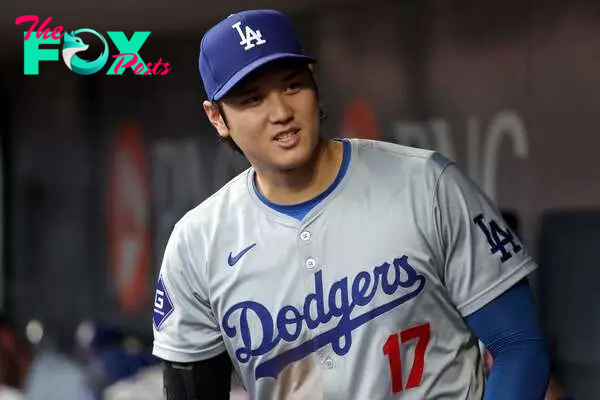 CINCINNATI, OHIO - MAY 24: Shohei Ohtani #17 of the Los Angeles Dodgers stands in the dugout during the fourth inning of the game against the Cincinnati Reds at Great American Ball Park on May 24, 2024 in Cincinnati, Ohio. Cincinnati defeated Los Angeles 9-6.   Kirk Irwin/Getty Images/AFP (Photo by Kirk Irwin / GETTY IMAGES NORTH AMERICA / Getty Images via AFP)