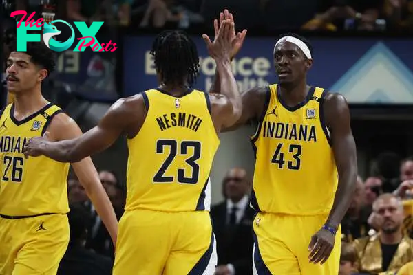 Indiana Pacers forward Pascal Siakam (43) celebrates with forward Aaron Nesmith (23) 