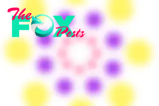 Concentric circles contain yellow, purple and pink circles. The image is blurred and appears to shake slightly