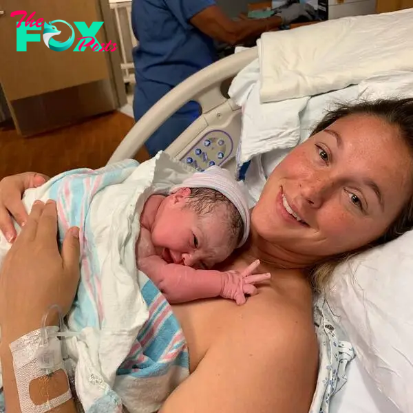 Kylie Kelce holding newborn Wyatt