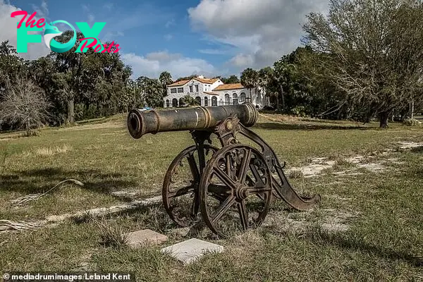 An old-fashioned cannon is pictured on the grounds of the Oakland property