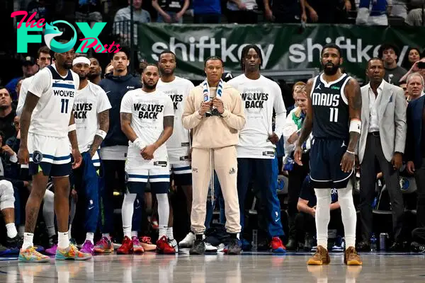 May 26, 2024; Dallas, Texas, USA; Dallas Mavericks guard Kyrie Irving (11) and \the Minnesota Timberwolves bench look on during game three of the western conference finals for the 2024 NBA playoffs at American Airlines Center. Mandatory Credit: Jerome Miron-USA TODAY Sports