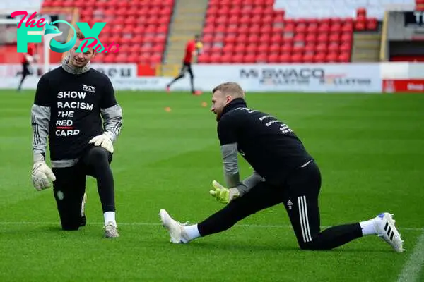 Conor Hazard and Scott Bain of Celtic warm up prior to the Ladbrokes Scottish Premiership match between Aberdeen and Celtic at Pittodrie Stadium on...