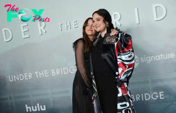 Riley Keough cuddles up to Lily Gladstone at the premiere of "Under the Bridge".