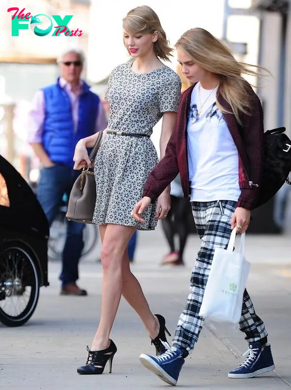  Taylor Swift and Cara Delevingne