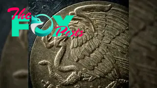 A close up image of a Mexican peso. It shows an eagle — a potent symbol in Aztec ideology — with a rattlesnake in its beak.