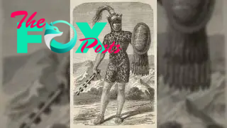 This is a drawing of Emperor Itzcoatl. He is wearing a short unitard made out of leopard skin, with his helmet made out of a leopard head with plumage coming out the top. He is holding a medium-sized oval shield with feathers hanging from the bottom in his left hand, and in his right hand he is holding a mace.