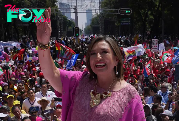 Senator Xóchitl Gálvez, opposition candidate for the presidential elections, waves during a political event at the Angel of Independence monument, in Mexico City on Sept. 3, 2023.