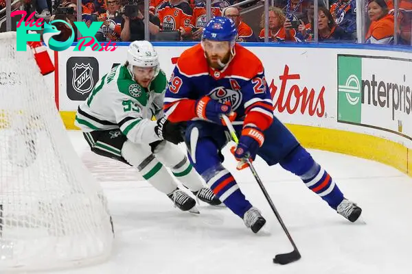 Jun 2, 2024; Edmonton, Alberta, CAN; Edmonton Oilers 29 looks to make a pass in front of Dallas Stars defensemen Thomas Harley (55) during the third period in game six of the Western Conference Final of the 2024 Stanley Cup Playoffs at Rogers Place. Mandatory Credit: Perry Nelson-USA TODAY Sports