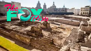 An image of the ruins of the Templo Mayor which was once one of the main temples of the Aztecs. Only the foundation is left and some steps at the building’s side.