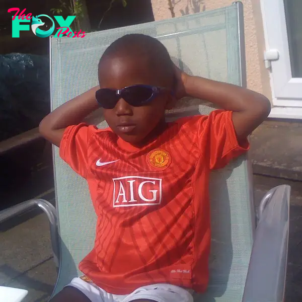 Kobbie Mainoo shared a snap of himself wearing a Man Utd AIG kit as a youngster