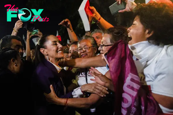 Claudia Sheinbaum greets her supporters on the day of the last presidential debate at the Tlatelolco University Cultural Center in Mexico City on May 19, 2024.