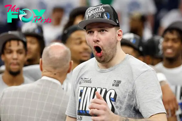 Luka Doncic #77 of the Dallas Mavericks celebrates after a 124-103 victory against the Minnesota Timberwolves in Game Five of the Western Conference Finals at Target Center on May 30, 2024 in Minneapolis, Minnesota.