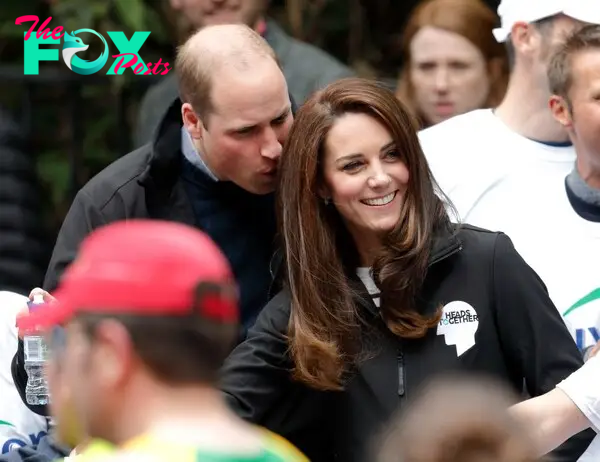 Kate Middleton smiling with Prince William